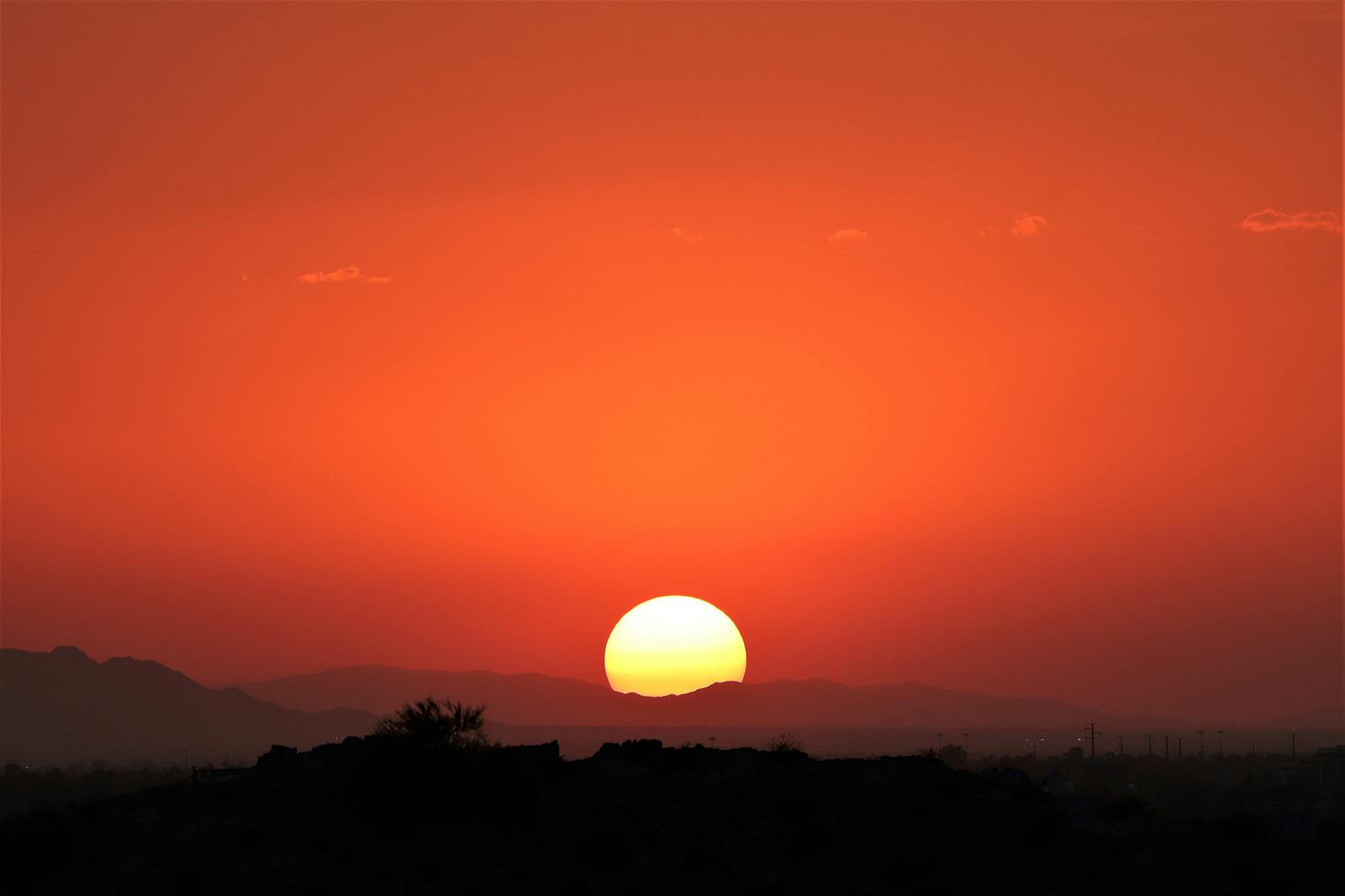 Phoenix skyline at sunset with desert mountains